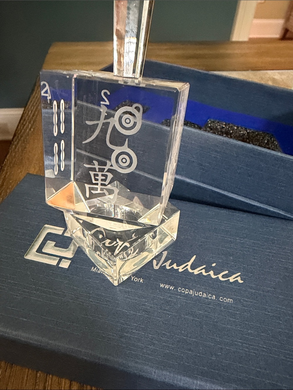 Crystal Mahjong Dreidel by Copa Judaica. 
Brand new in box. 4” high by 2” wide. - Picture 2 of 7